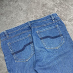 Cute 2000s bootcut low rise embroidered washed jeans, measures 34W x 35.5” outseam length