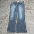 Sick 2000s low rise bootcut washed jeans, measures 35W x 30L