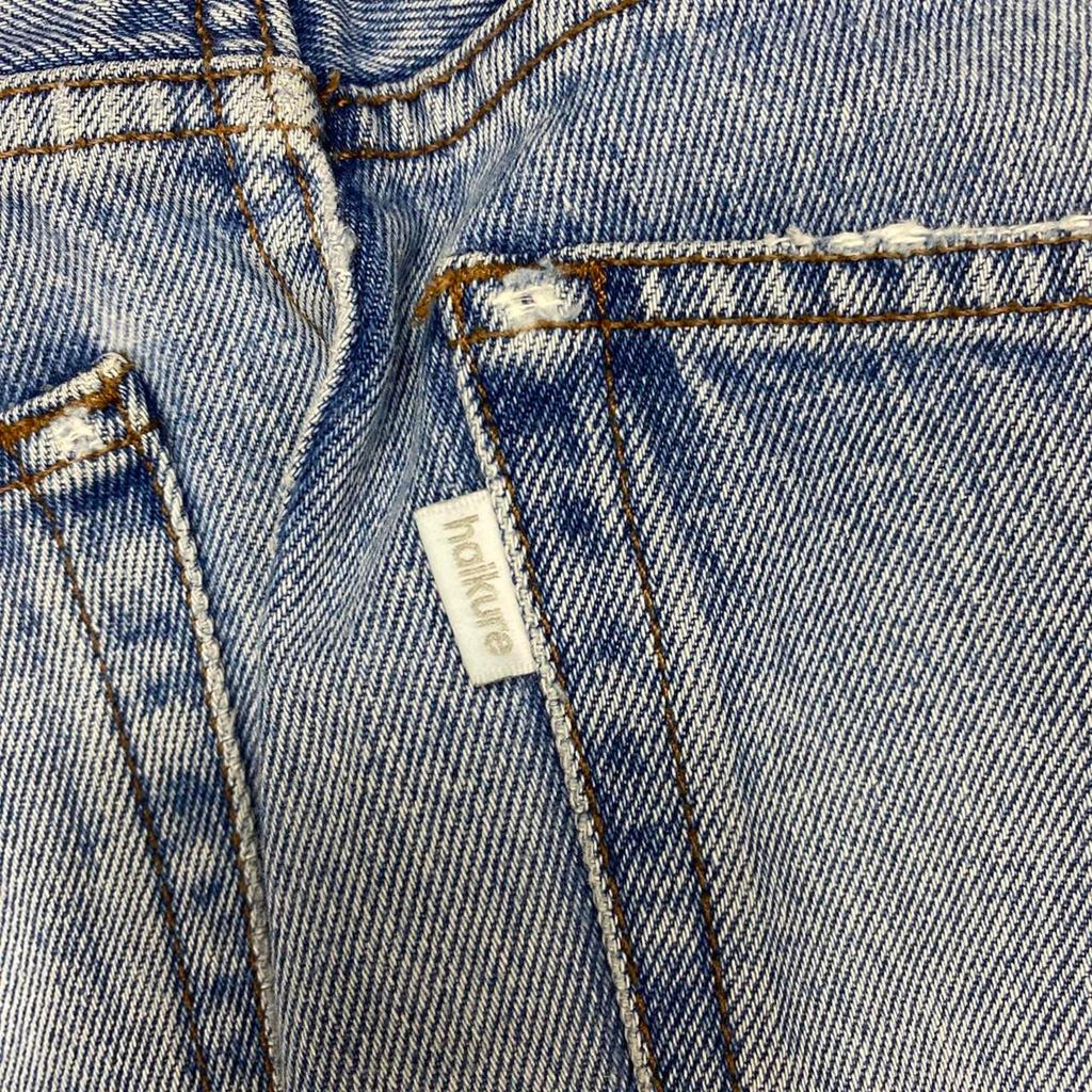 Sick haikure designer flare distressed made in Italy jeans, measures 27W x 27.5L