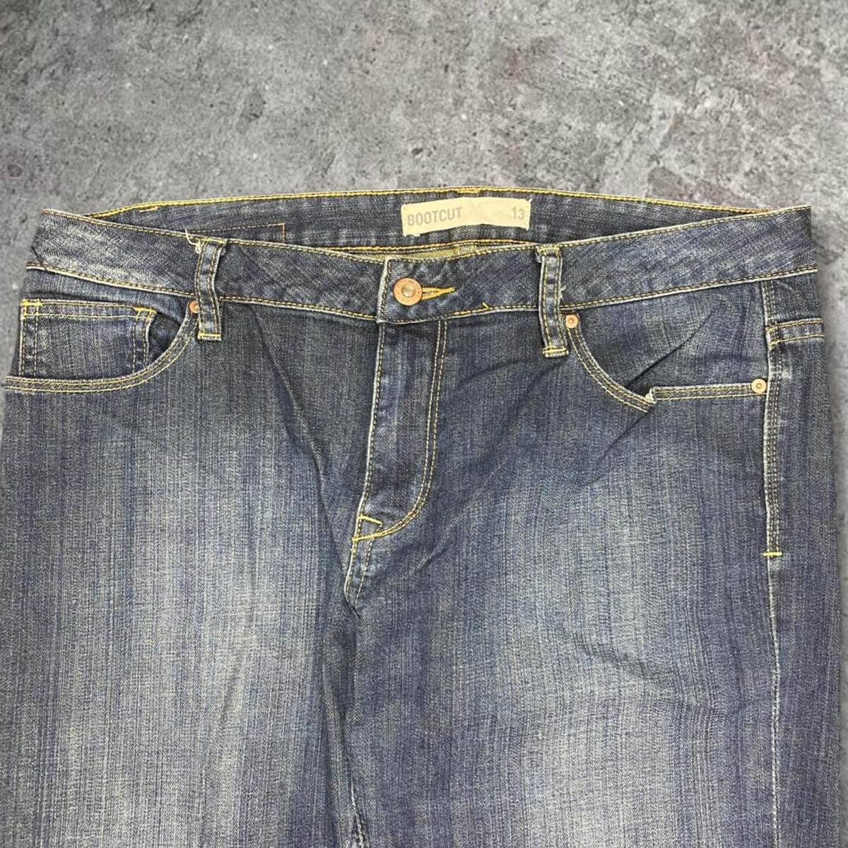 Sick 2000s low rise bootcut washed jeans, measures 35W x 30L