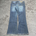 Sick 2000s low rise bootcut washed jeans, measures 35W x 30L