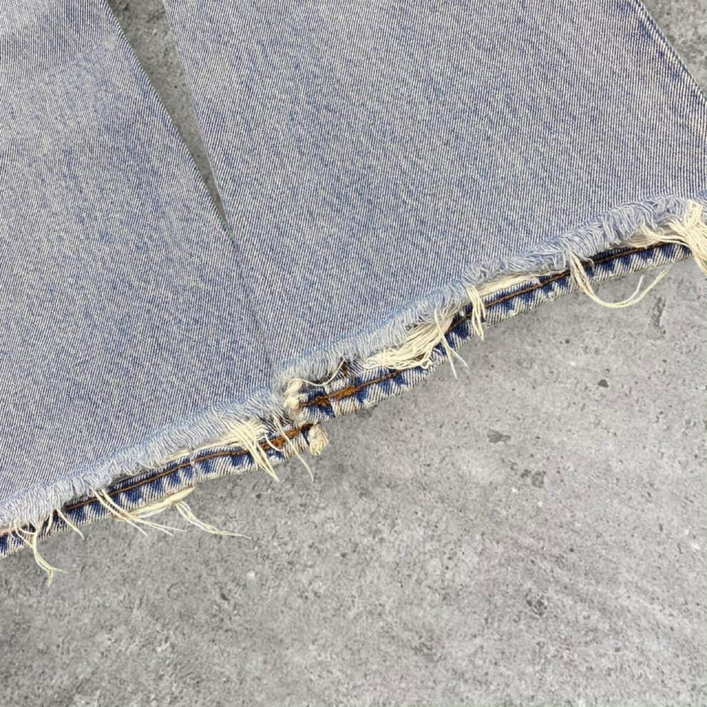 Sick haikure designer flare distressed made in Italy jeans, measures 27W x 27.5L