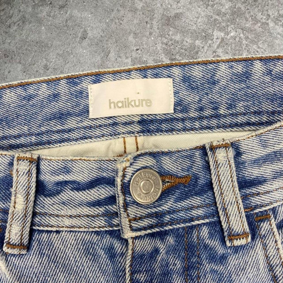 Sick haikure designer flare distressed made in Italy jeans, measures 27W x 27.5L