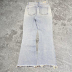 Sick haikure designer flare distressed made in Italy jeans, measures 27W x 27.5L